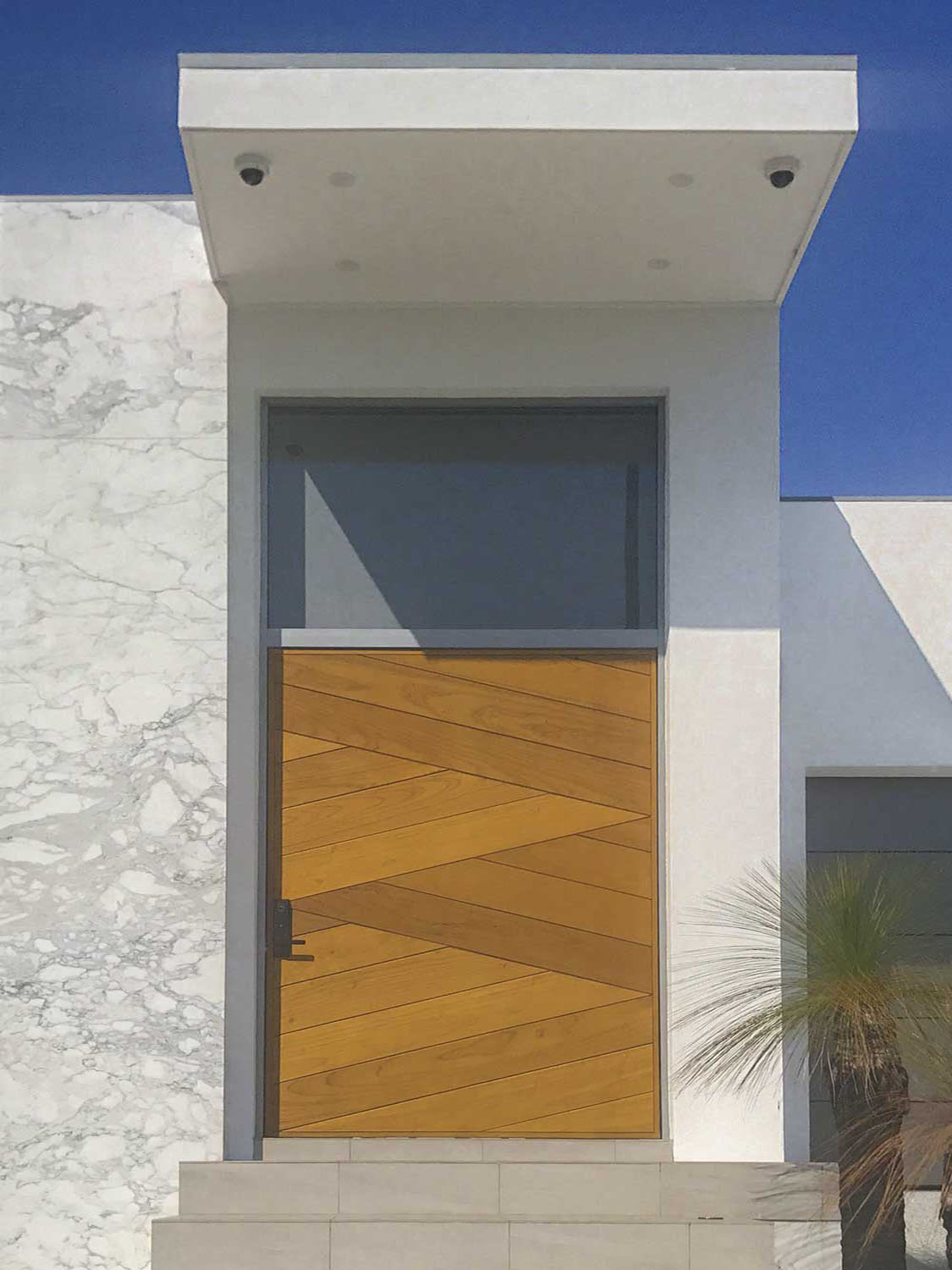 Diagonal clad door custom pivot door